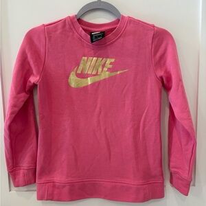 Adorable girls pink Nike Sweatshirt with gold logo